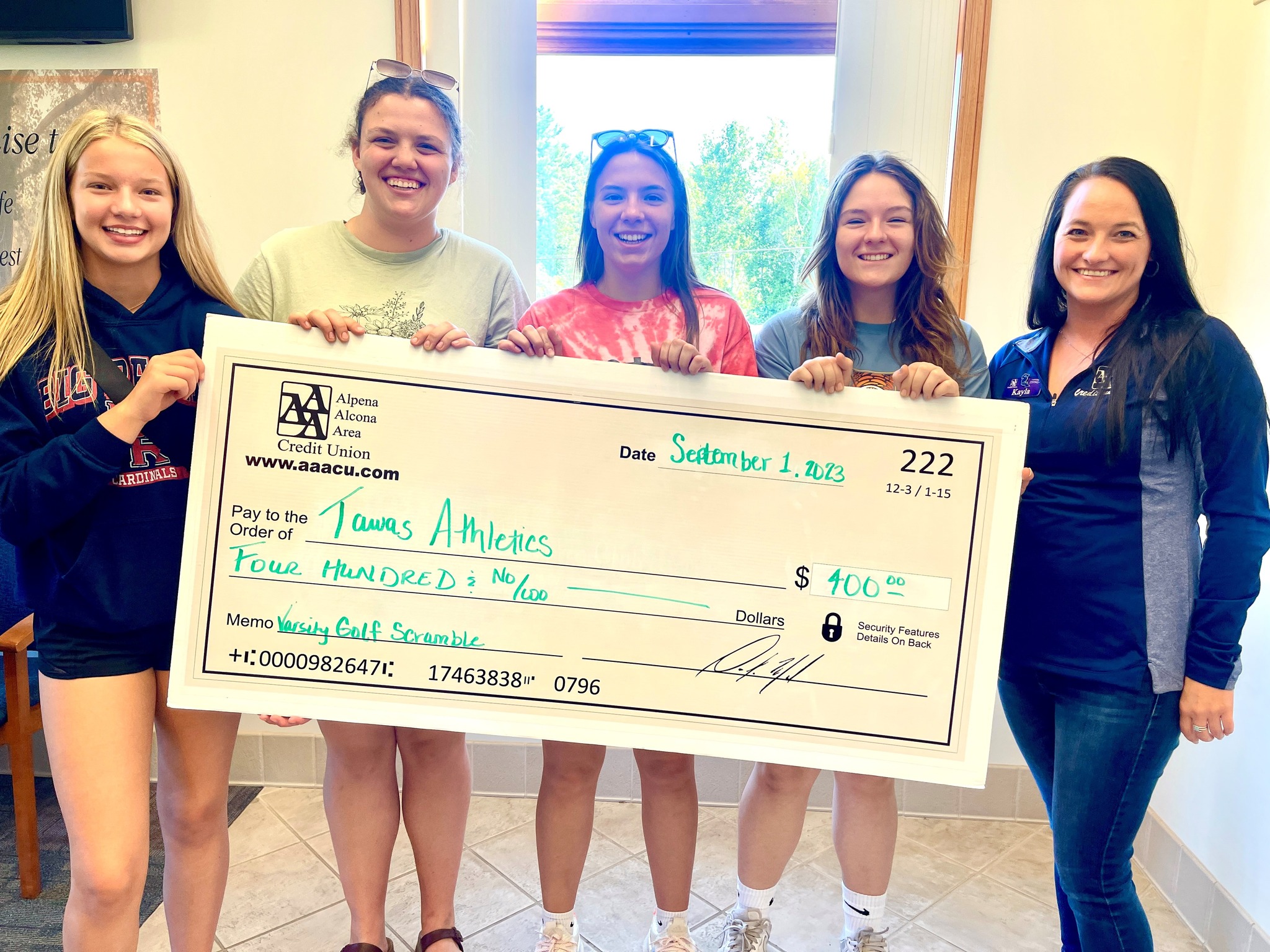 AAACU donates $400 to Tawas City athletic programs in 2023